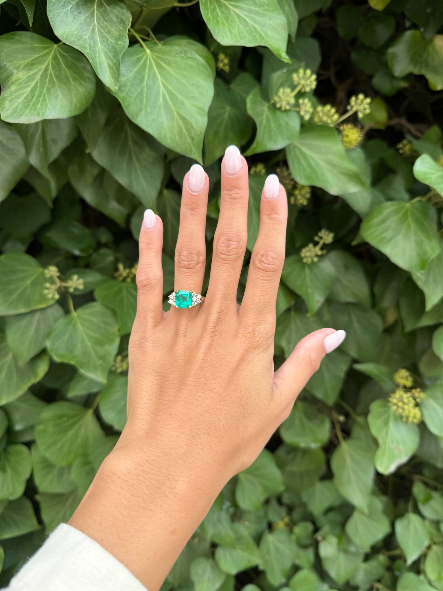 4ct Emerald Ring with Round Accent Stones