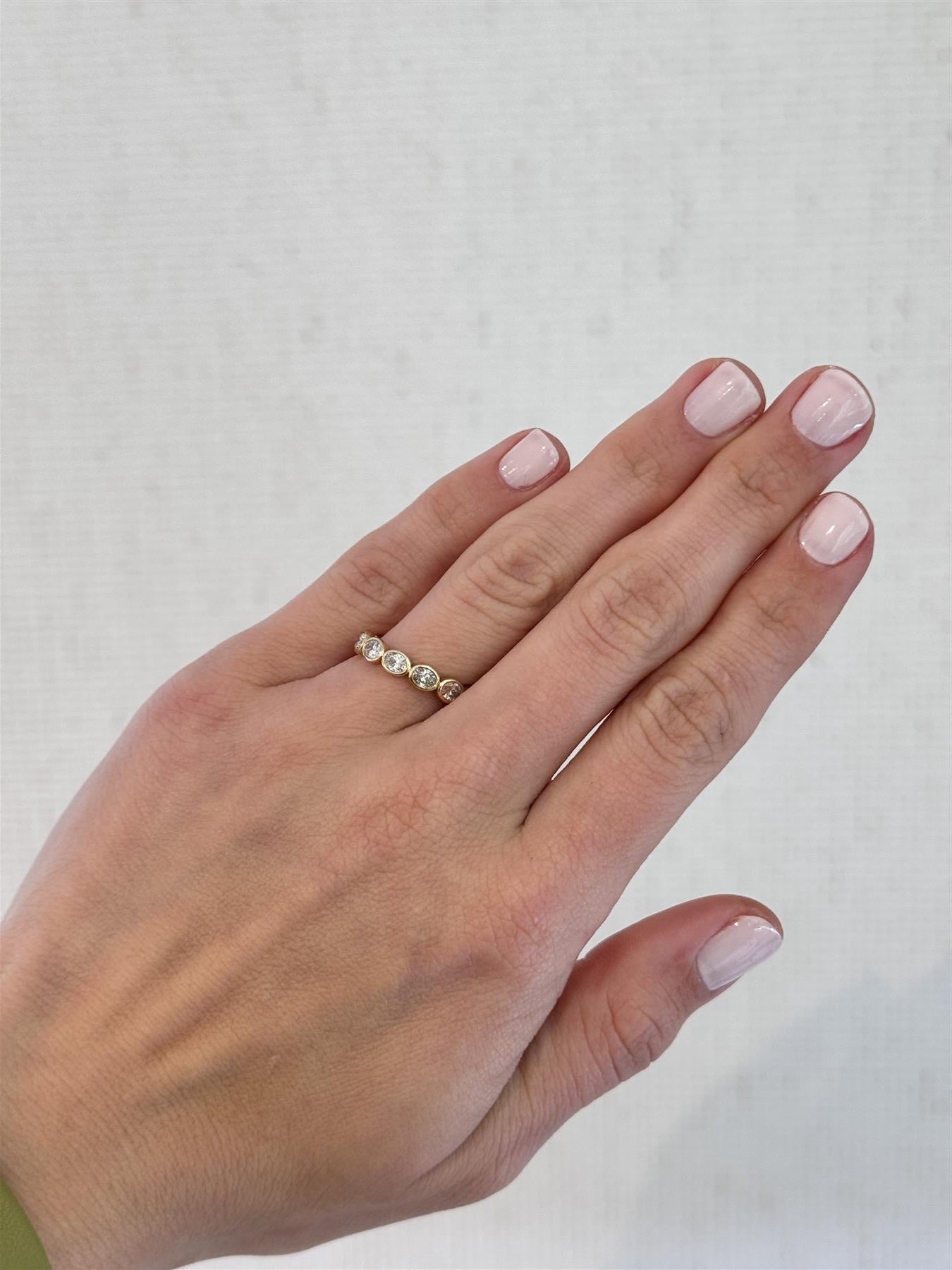 East-West Bezel Set Oval Diamond Eternity Band