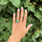 4ct Emerald Ring with Round Accent Stones