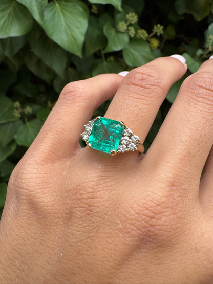 4ct Emerald Ring with Round Accent Stones
