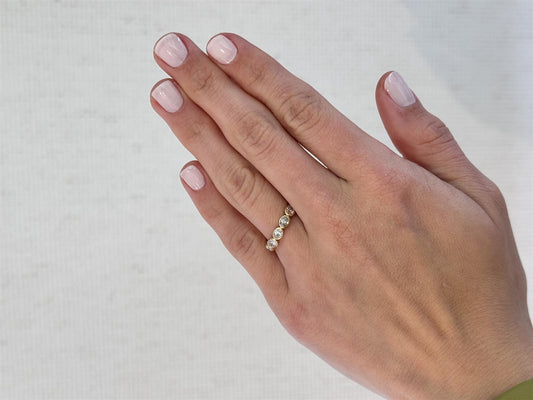 East-West Bezel Set Oval Diamond Eternity Band